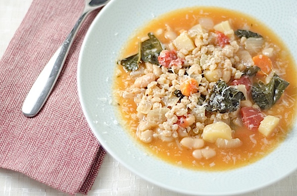 Get cozy with this comforting bowl of Vegetarian Italian Farro Soup recipe. This clean eating recipe makes a delicious lunch or dinner that will keep you full while you feel light. Try this easy soup recipe. #recipe #healthy #healthyrecipes #cleaneating #recipe #realfood #vegan #vegetarian