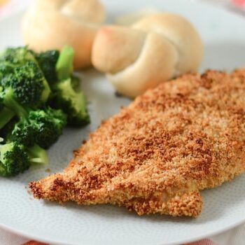 Enjoy fried chicken without all the oil with this easy Spiced Oven-Fried Chicken recipe. This clean eating recipe is made with only 5 ingredients and is a delicious dinner idea. Slice leftovers for salad the next day. #recipe #healthy #healthyrecipes #healthyfood #cleaneating #chicken #dinner #dinnerrecipes