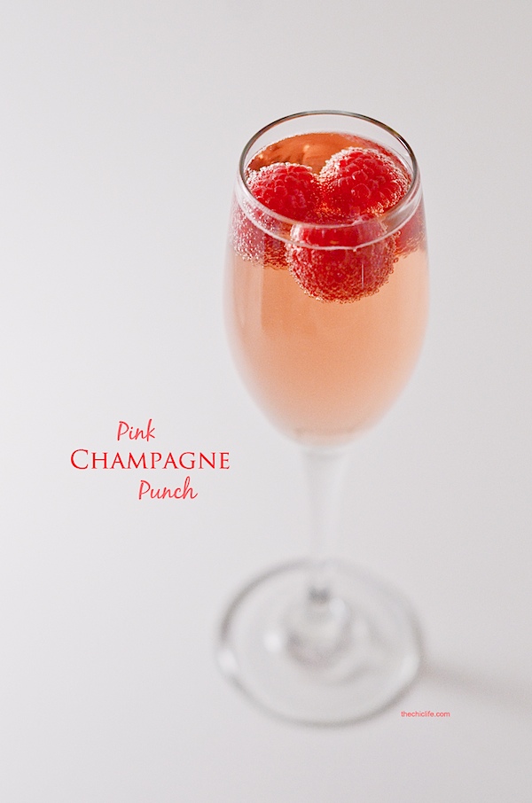 This makes the prettiest pink holiday punch. Go glam with your holiday party and serve this gorgeous champagne cocktail made with superfood pomegranate juice. Cheers! #recipe #healthy #healthyrecipes #healthyfood #cleaneating #recipe #christmasfood #holidaydrink #cocktail #holidayparty