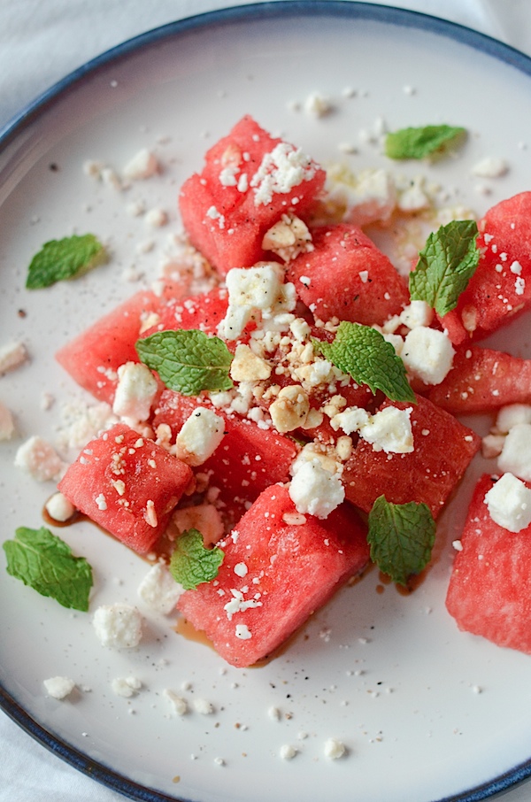 So easy and good! This 5 minute Watermelon Feta Mint Salad whips up in a jiffy and makes a delicious, clean eating, vegetarian side or main dish for a beautiful summer day. #recipe #healthy #healthyrecipes #healthyfood #cleaneating #vegetarian #healthyfoodideas