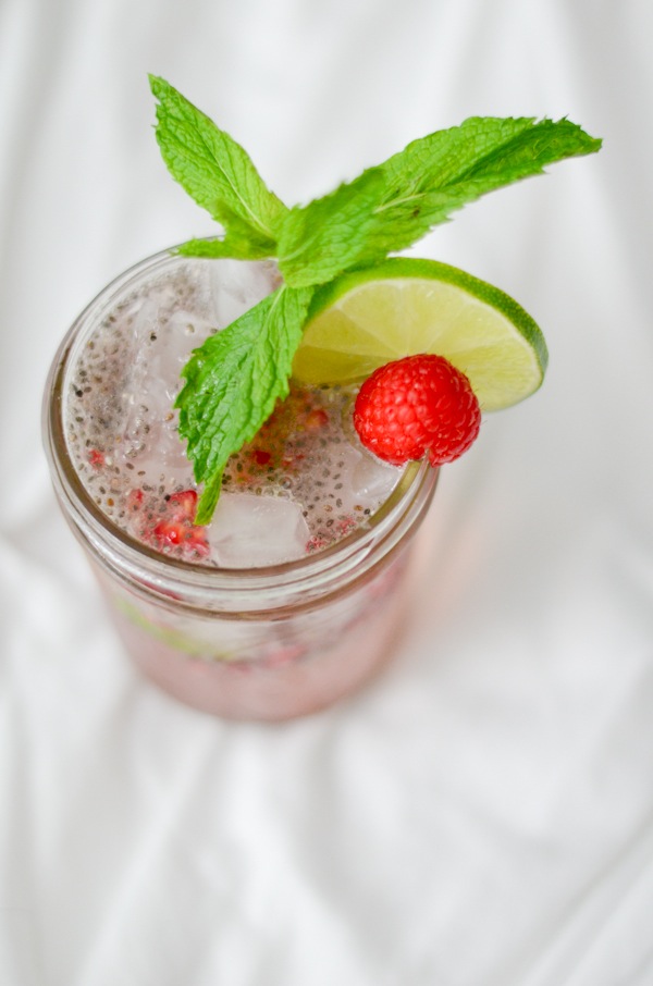 So refreshing for a hot summer day! This Raspberry Lime Chia Fresca Drink Recipe is a healthy soda alternative with superfoods! #drink #healthydrink #cleaneating #chiaseedrecipes #drinkrecipes #drinkideas