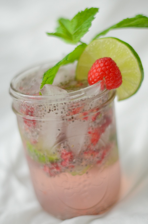 So refreshing for a hot summer day! This Raspberry Lime Chia Fresca Drink Recipe is a healthy soda alternative with superfoods! #drink #healthydrink #cleaneating #chiaseedrecipes #drinkrecipes #drinkideas