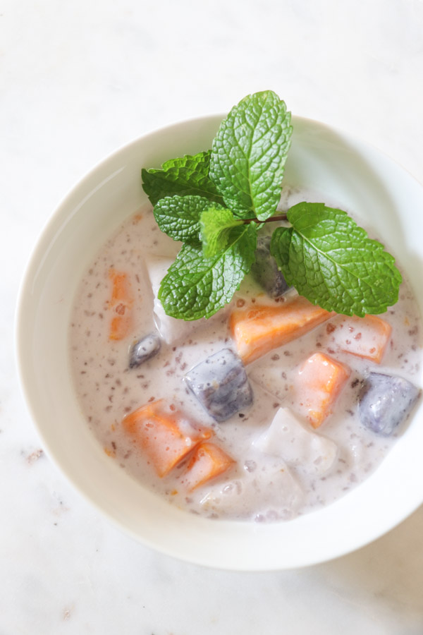 Looking for a healthy dessert/snack recipe? Try this easy and delicious sweet potato/taro root, coconut milk recipe for Ginataang. This Filipino treat is a FUN clean eating recipe to sneak healthy root vegetables into your diet. #recipe #healthy #healthyrecipes #cleaneating #vegan #vegetarian #desserts #dessertfoodrecipes