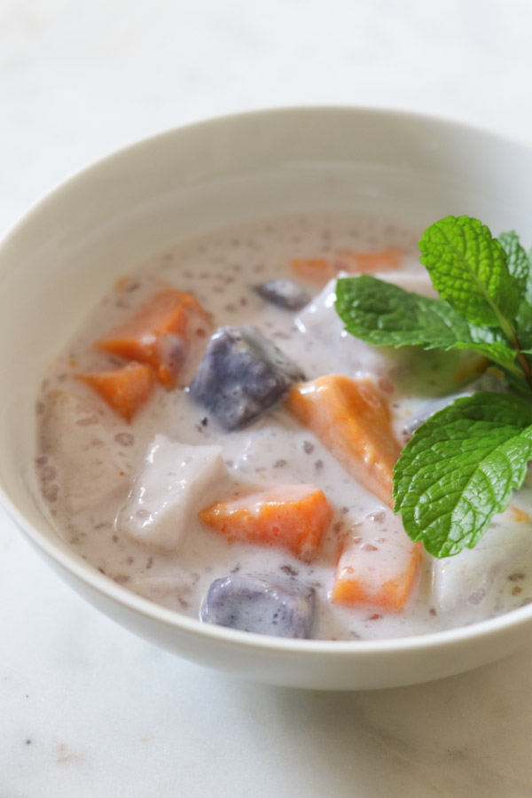 Looking for a healthy dessert/snack recipe? Try this easy and delicious sweet potato/taro root, coconut milk recipe for Ginataang. This Filipino treat is a FUN clean eating recipe to sneak healthy root vegetables into your diet. #recipe #healthy #healthyrecipes #cleaneating #vegan #vegetarian #desserts #dessertfoodrecipes