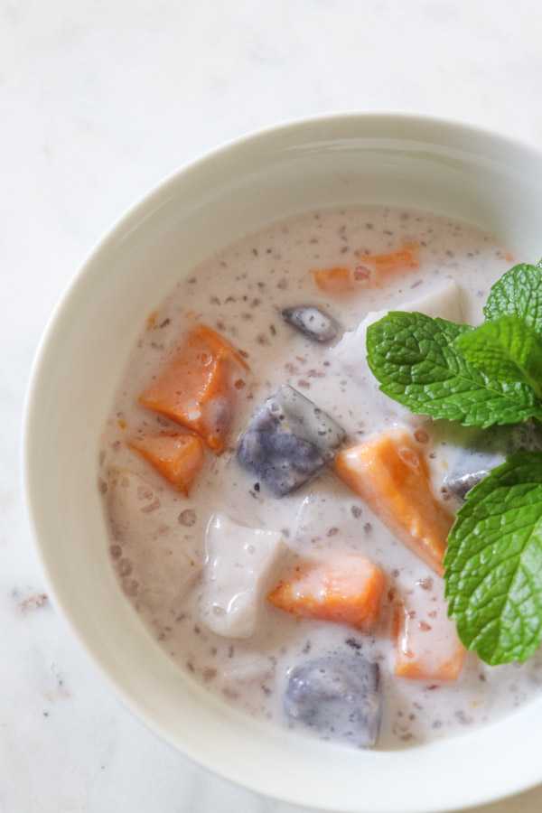 Looking for a healthy dessert/snack recipe? Try this easy and delicious sweet potato/taro root, coconut milk recipe for Ginataang. This Filipino treat is a FUN clean eating recipe to sneak healthy root vegetables into your diet. #recipe #healthy #healthyrecipes #cleaneating #vegan #vegetarian #desserts #dessertfoodrecipes