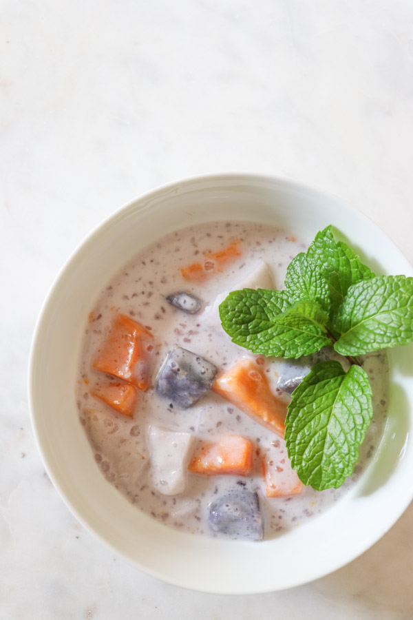 Looking for a healthy dessert/snack recipe? Try this easy and delicious sweet potato/taro root, coconut milk recipe for Ginataang. This Filipino treat is a FUN clean eating recipe to sneak healthy root vegetables into your diet. #recipe #healthy #healthyrecipes #cleaneating #vegan #vegetarian #desserts #dessertfoodrecipes