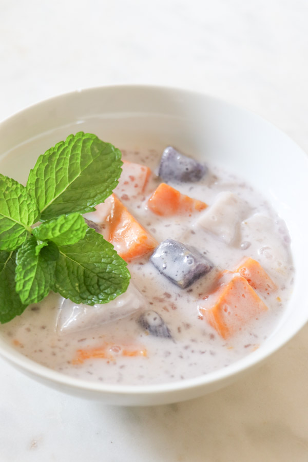 Looking for a healthy dessert/snack recipe? Try this easy and delicious sweet potato/taro root, coconut milk recipe for Ginataang. This Filipino treat is a FUN clean eating recipe to sneak healthy root vegetables into your diet. #recipe #healthy #healthyrecipes #cleaneating #vegan #vegetarian #desserts #dessertfoodrecipes