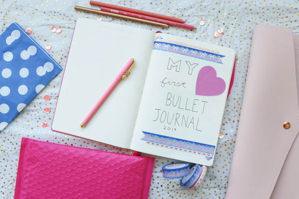 Here's a super EASY idea for a Bullet Journal title page for your first bullet journal. Make it look pretty without drawing by using washi tape and stickers. Click for supplies used #bulletjournal #bulletjournalideas #bujo #planner