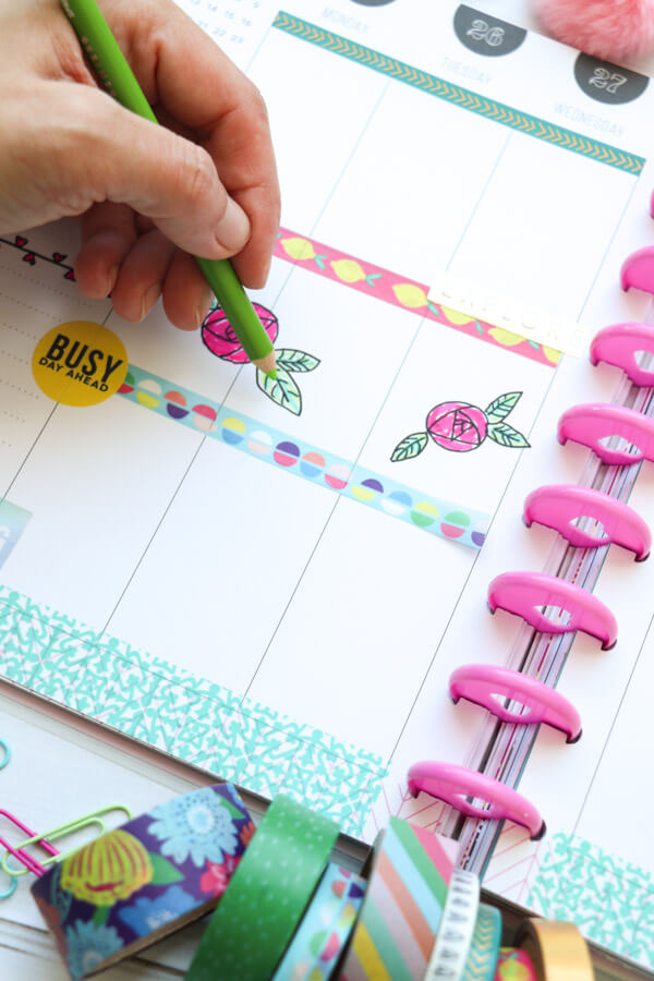 Doodles + washi tape for a colorful weekly spread in my Happy Planner for the week of PlannerCon 2019! This is made with ink pen and colored pencils in addition to washi tape and stickers. Love the flower doodles! #planner #planning #plannerdecorations #plannerideas #happyplanner 