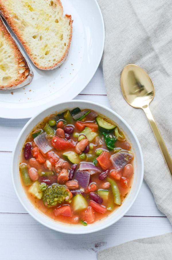 This is one of my weight loss secrets - soup! It's filling, delicious, and easy to make. And this clean eating Quick Veggie Bean Soup recipe is a winner. Plus it makes plenty of leftovers for easy lunch and dinner meals later in the week. #recipe #healthy #healthyrecipes #healthyfood #cleaneating #dinner #dinnerrecipes #vegan #vegetarian