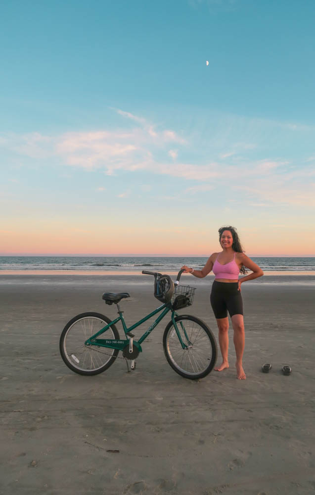 Diana at Kiawah Island Resort beach with a bicycle