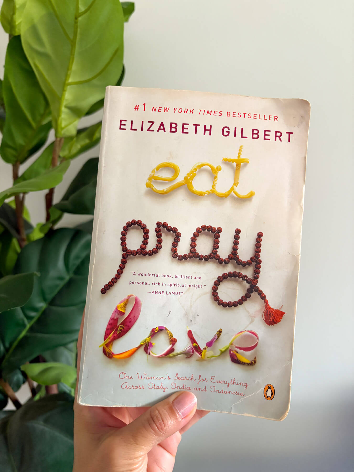 The cover of the book Eat, Pray, Love by Elizabeth Gilbert
