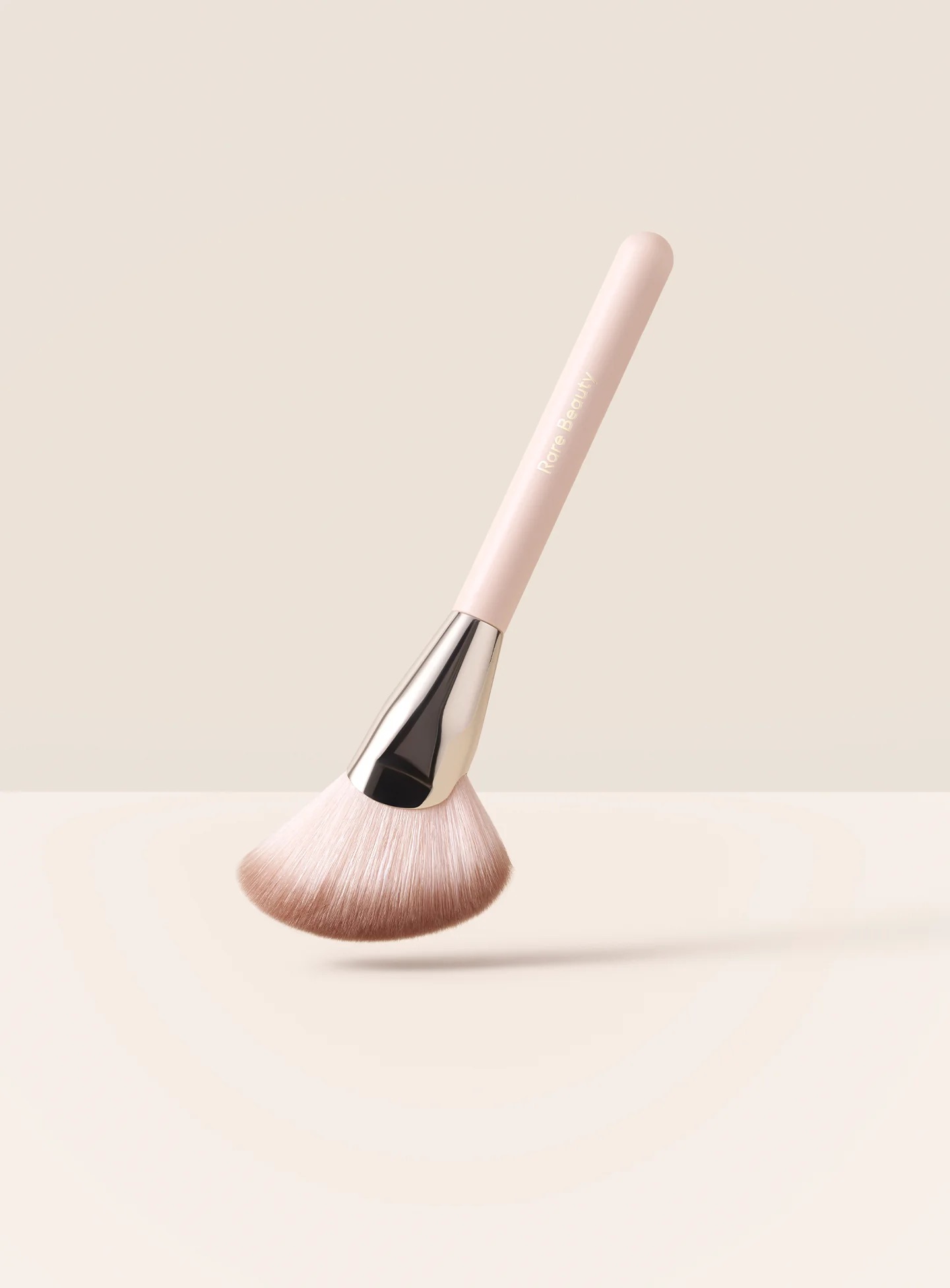 Angled powder brush